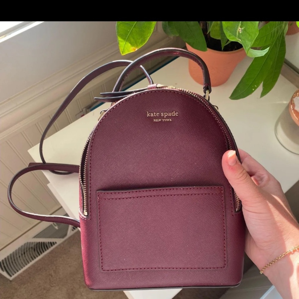 Kate Spade Maroon Backpack Sleek Design Compact